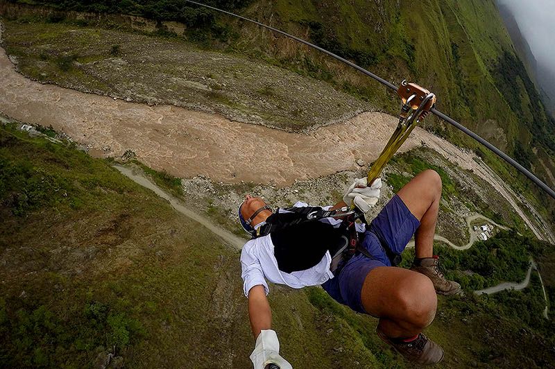 zipline, climbing rock and suspension bridge in the salkantay trek